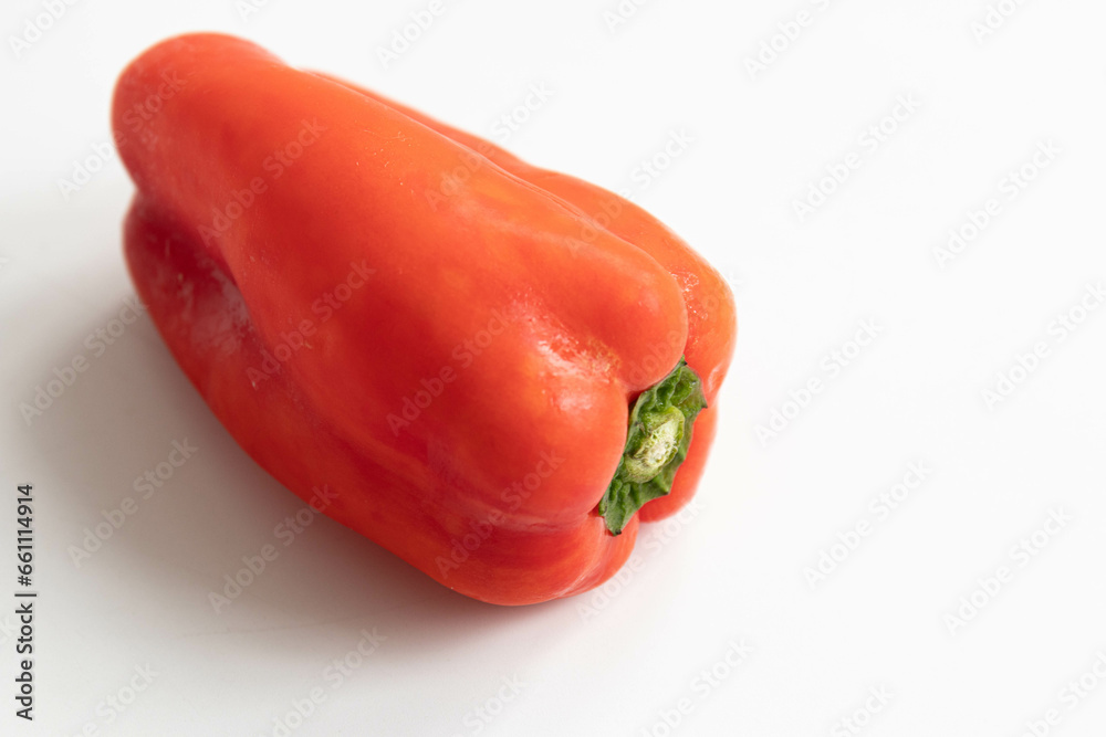 Slice of yellow bell pepper on a black background. Close up. Slice of yellow bell pepper on a black background. Close up.