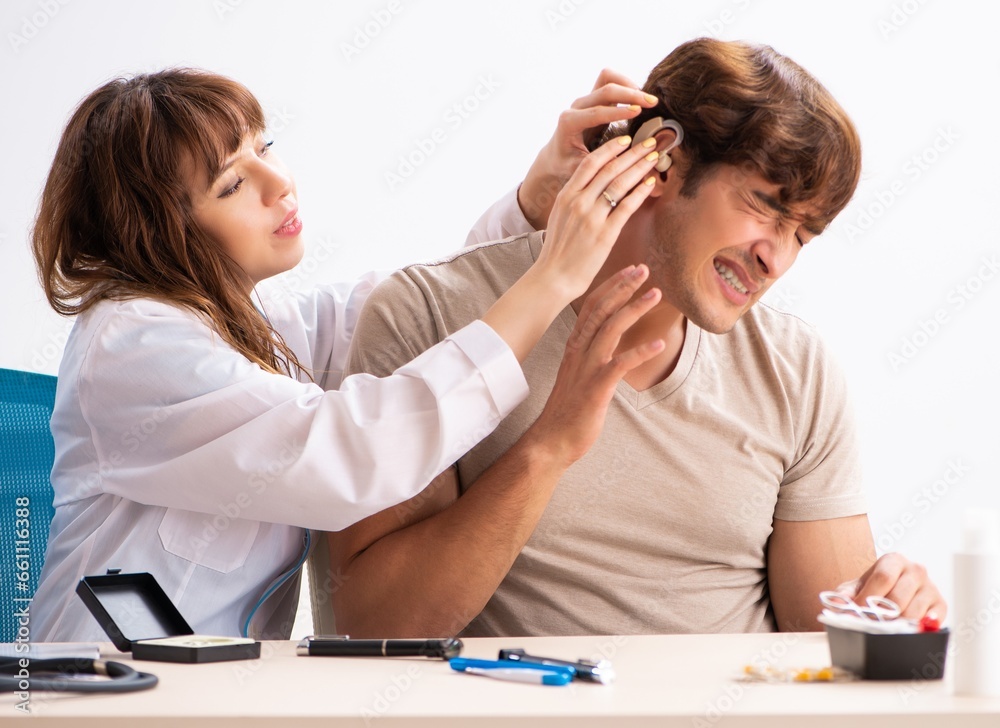 Patient with hearing problem visiting doctor otorhinolaryngologi Patient with hearing problem visiting doctor otorhinolaryngologi