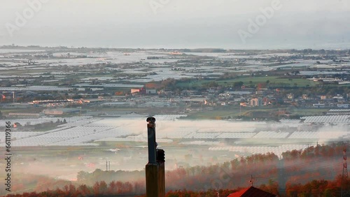 Smoke that spreads across the plains