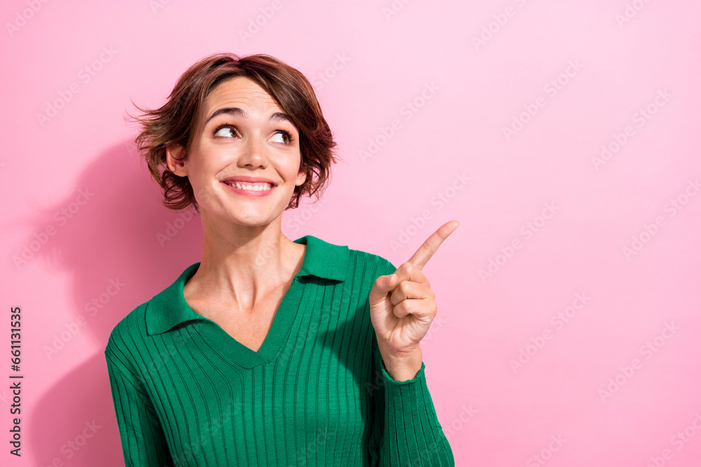 Portrait of toothy beaming woman with short hair wear stylish shirt directing look at sale empty space isolated on pink color background Portrait of toothy beaming woman with short hair wear stylish shirt directing look at sale empty space isolated on pink color background