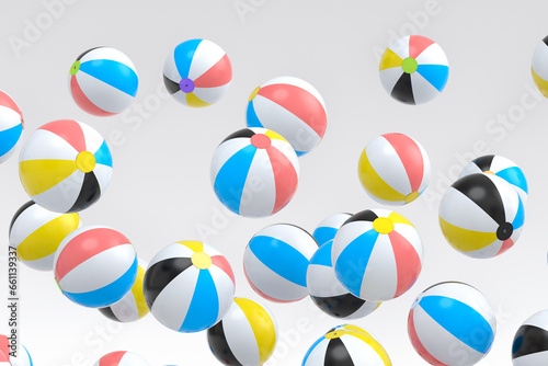 Many of flying beach balls isolated on white background