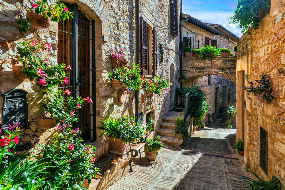 Traditional old villages of Italy, Umbria - beautiful Spello town. Charming floral streets decoration