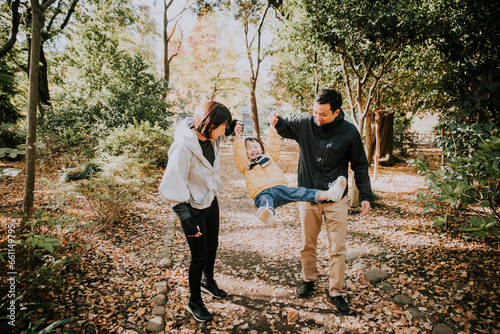 Happy japanese family spending time outdoor