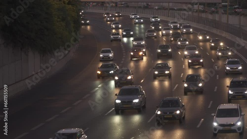 Tel Aviv, Israel : Cars  on Traffic load Driving In Jam On Ayalon  Freeway In Tel Aviv. Lighting reflection.