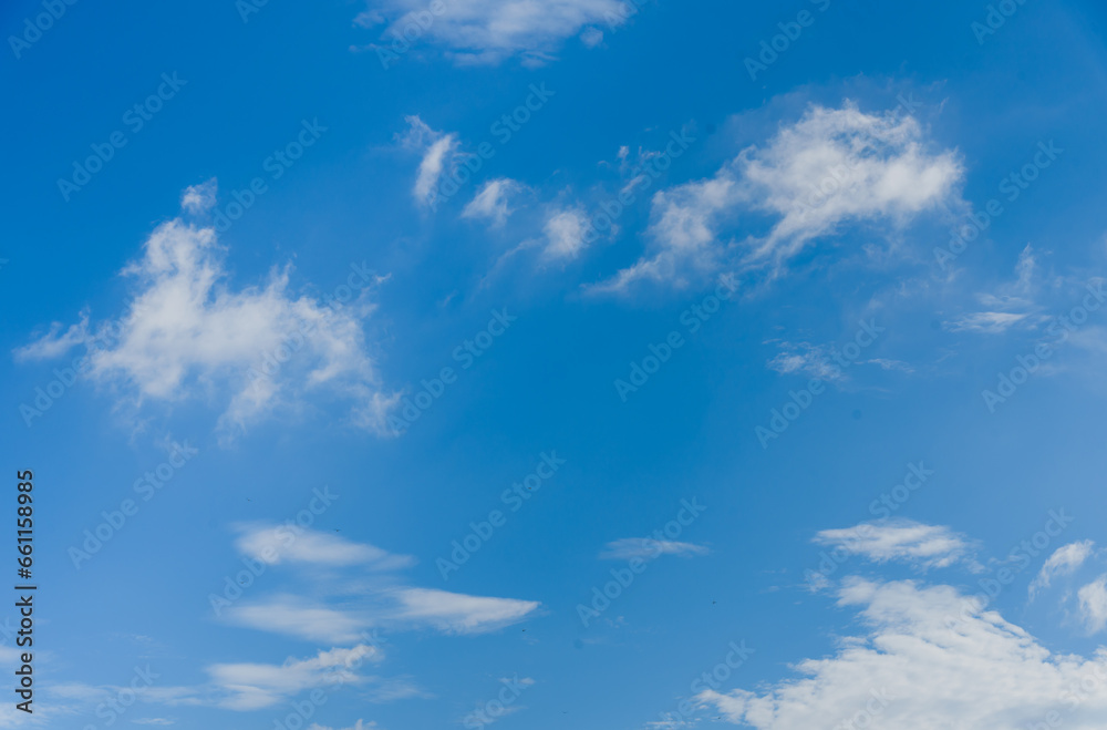 blue sky with white, soft clouds blue sky with white, soft clouds
