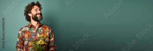 middle age man wearing casual clothes smiling looking to the side against a green background. copy space. Banner design with space for text