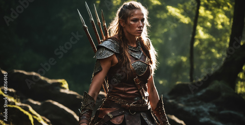 An adventurous female hero, armed and vigilant in an enchanting woodland, epitomizing medieval fantasy courage. Perfect for fantasy literature and gaming concepts.. photo