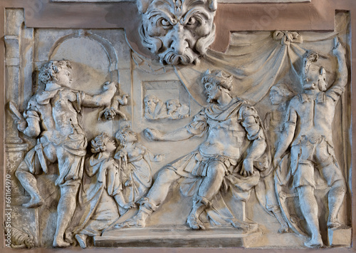 GENOVA, ITALY - MARCH 8, 2023: The relief in stucco The Judgement of king Salomon in the church Chiesa di San Rocco sopra Principe by Marcello Sparzo (1514). photo