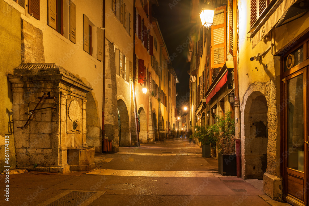 A street in the evening with lights, in the evening, in Annecy, Haute-Savoie, France