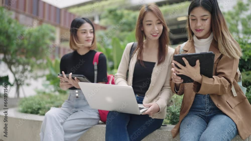 Asian young female student university meet and discuss learning lesson in campus Asian young female student university meet and discuss learning lesson in campus