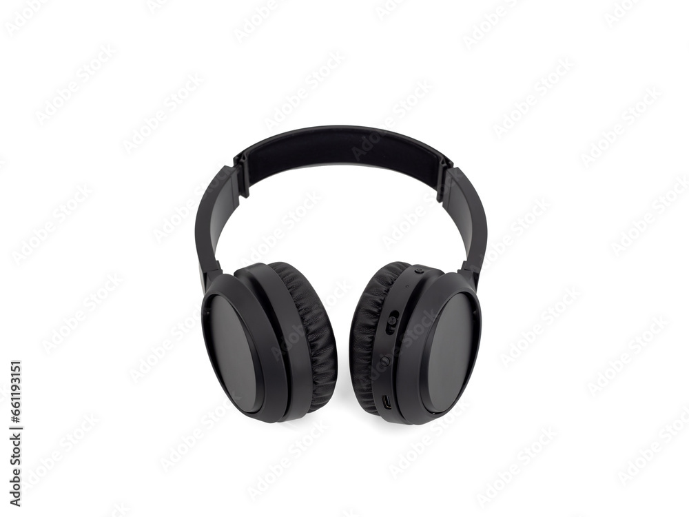 Black wireless headphones isolated on a white background. Wireless headphones close-up. Black wireless headphones isolated on a white background. Wireless headphones close-up.