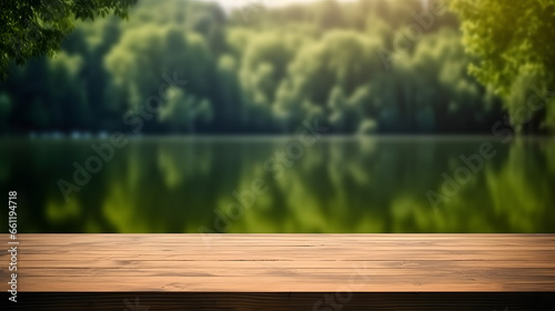 The empty wooden table top with blur background of summer lakes green forest. High quality photo