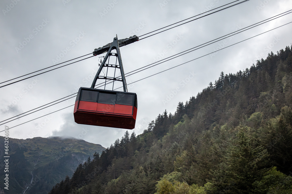 cable car going up the mountains of Alaska cable car going up the mountains of Alaska