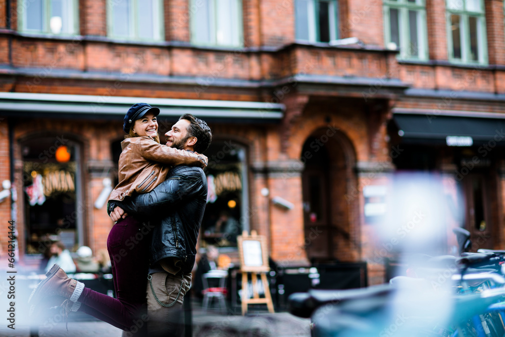 Young loving couple sharing a moment during a walk in the city