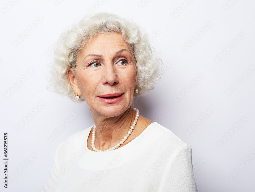 lifestyle, emotion and people concept: Grey haired old nice beautiful smiling woman.