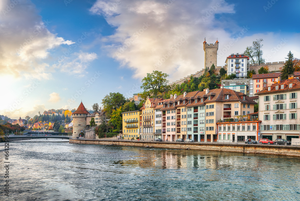 Outstanding historic city center of Lucerne with famous buildings and Nolliturm tower on Reuss river. Popular travel destination .  Location: Lucerne, Canton of Lucerne, Switzerland, Europe