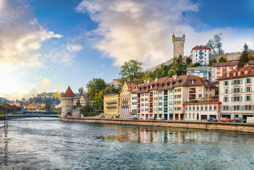 Outstanding historic city center of Lucerne with famous buildings and Nolliturm tower on Reuss river. Popular travel destination . Location: Lucerne, Canton of Lucerne, Switzerland, Europe