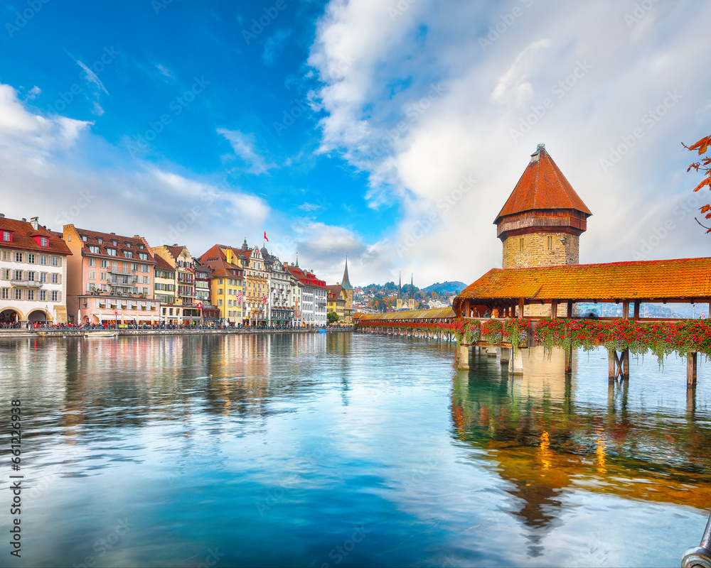 Breathtaking historic city center of Lucerne with famous buildings and old wooden Chapel Bridge (Kapellbrucke) Breathtaking historic city center of Lucerne with famous buildings and old wooden Chapel Bridge (Kapellbrucke)