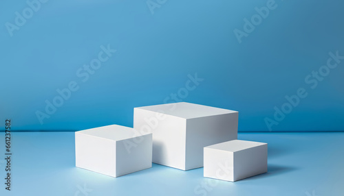 Square podium stage for the demonstration of cosmetics on blue background