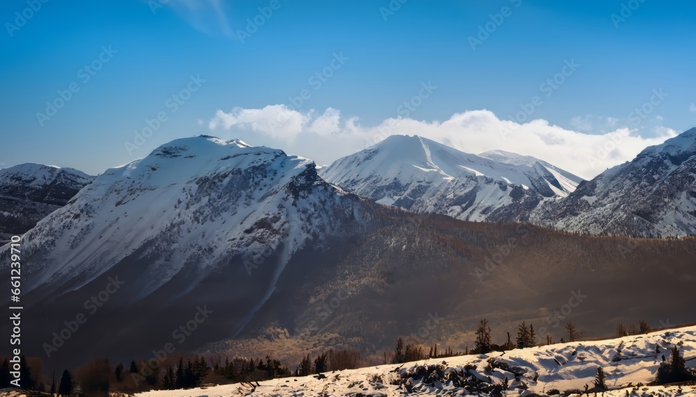 Beautiful landscape of a snowy mountain with dramatic and beautiful lighting
