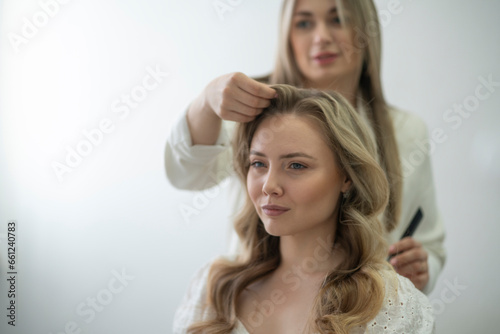 make-up salon, doing some procedures to a female face