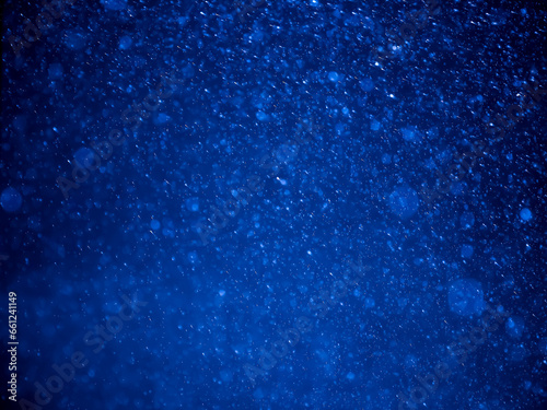 Abstract background, blur, bokeh, raindrops, blue background.