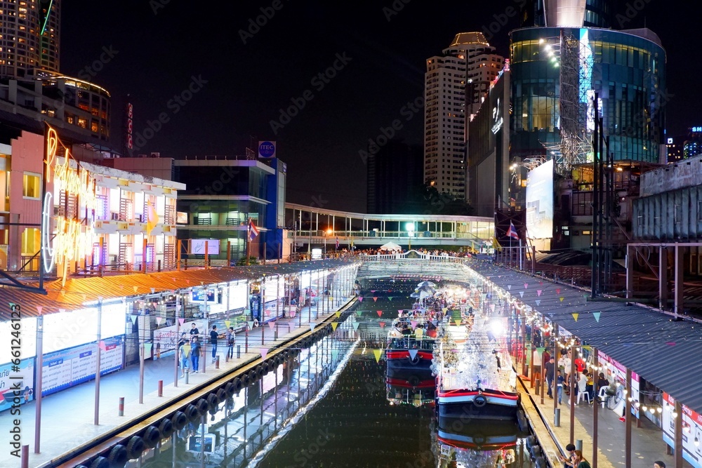 Bangkok, Thailand - December 31, 2019 : Pratunam floating night market with its restaurants and boats at night in Bangkok