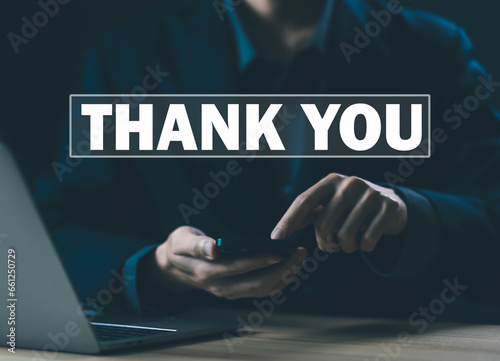 businessman using a phone and sending the message thank you on a display screen. concept of congratulations, appreciation, and gratitude, thank you business. presentation from technology digital