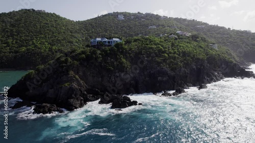 Beautiful drone view homes on mountain top st. thomas coki beach sapphire beach turquoise water waves blue sky white clouds east end red hook photo