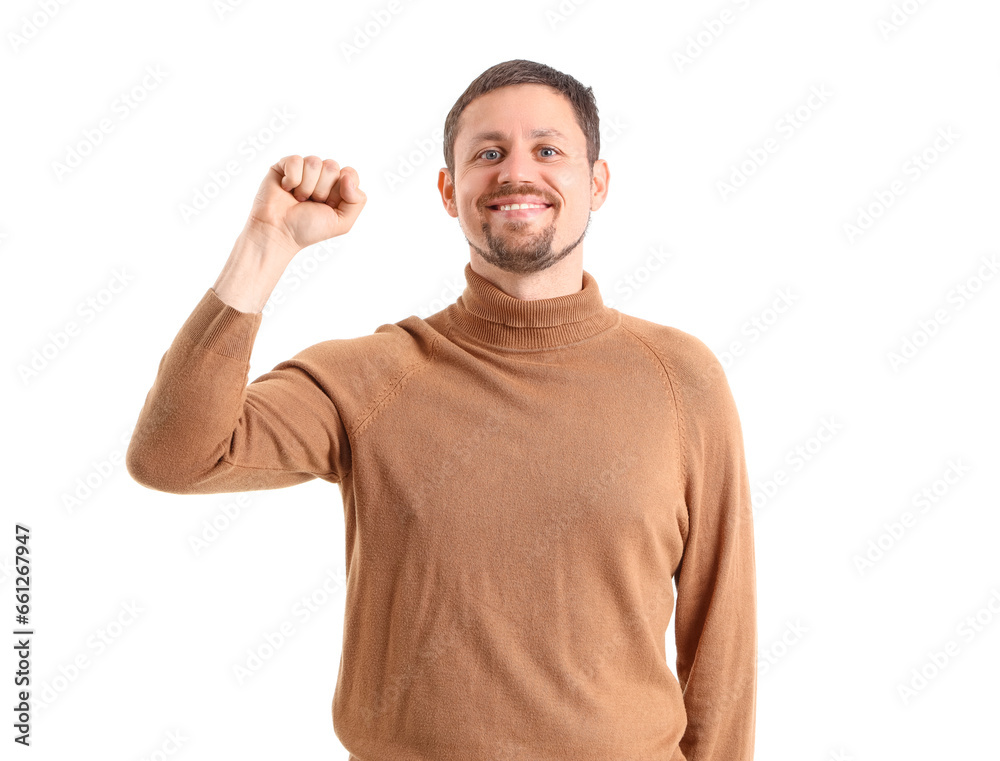 Handsome man with clenched fist on white background Handsome man with clenched fist on white background