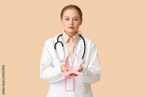 Female doctor with pink rib...