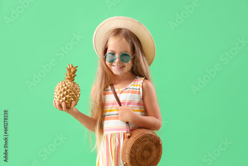 Cute little girl with pinea...