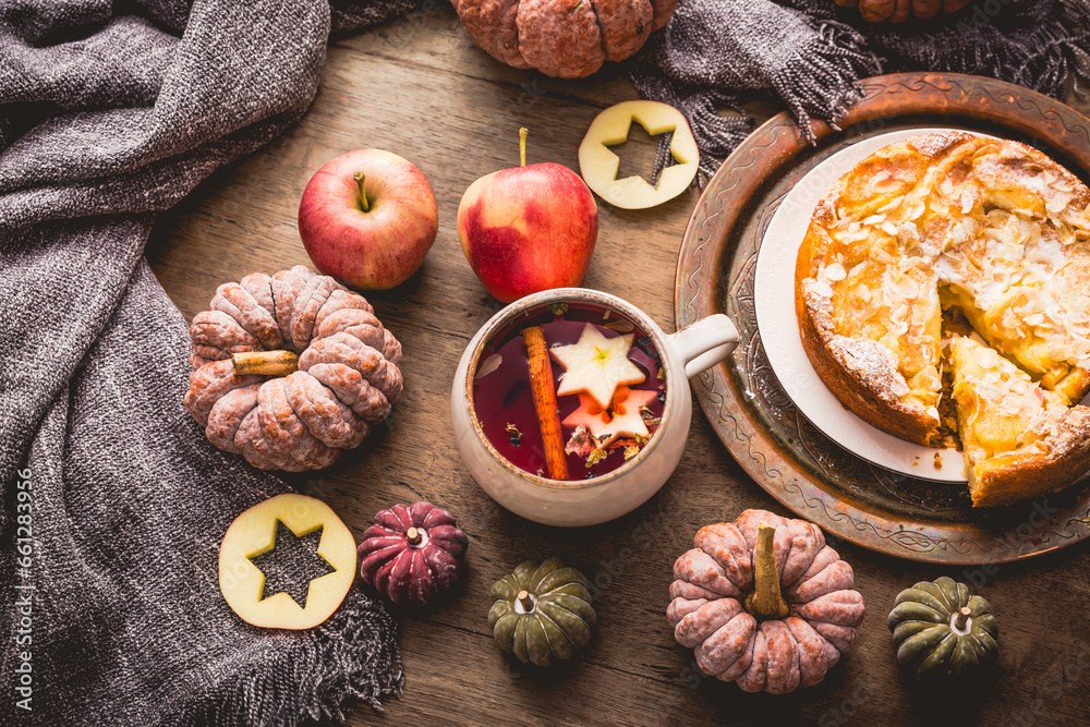 Fototapeta premium Herbal tea with fruits and cinnamon with apple pie for Thanksgiving