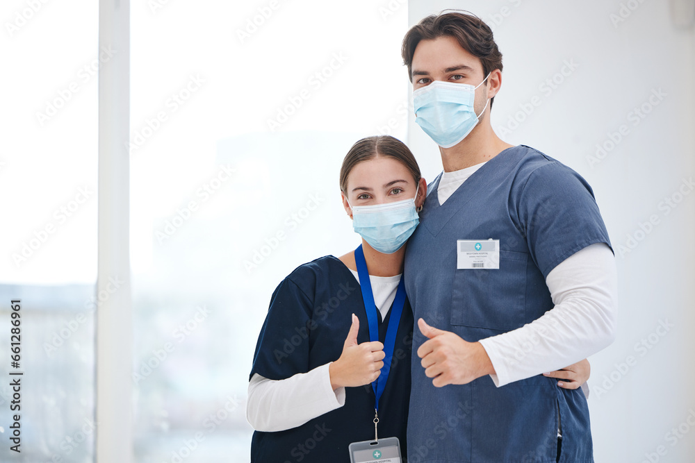 Portrait, doctors and people hug, thumbs up or vote opinion for medical support, service agreement or job well done. Safety face mask, emoji like sign and surgeon team embrace, trust and yes feedback