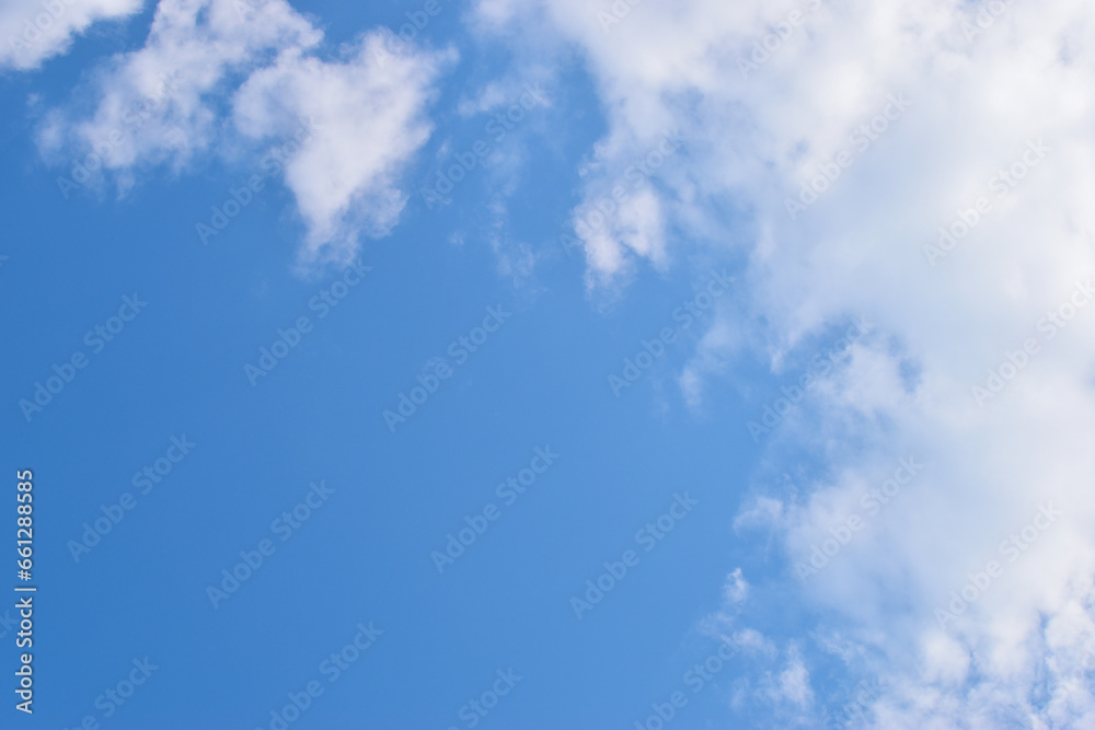 beautiful blue sky and white fluffy group of clouds with sunrise in the morning, natural background beautiful blue sky and white fluffy group of clouds with sunrise in the morning, natural background