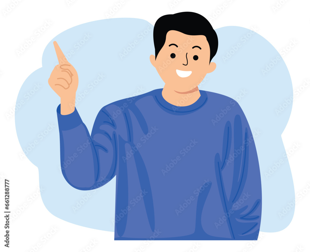 young man smiling and pointing index finger up at copy space young man smiling and pointing index finger up at copy space