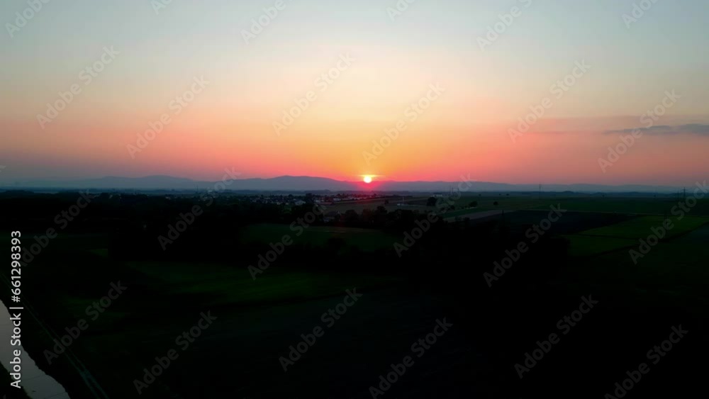 Sunset Over Scenic Countryside Landscape - aerial drone shot Sunset Over Scenic Countryside Landscape - aerial drone shot