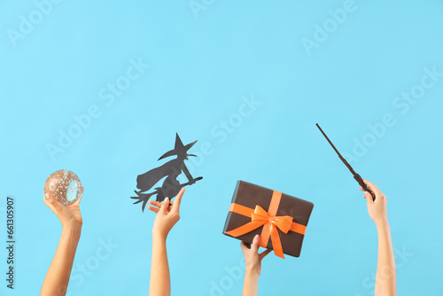 Women with Halloween gift, ...