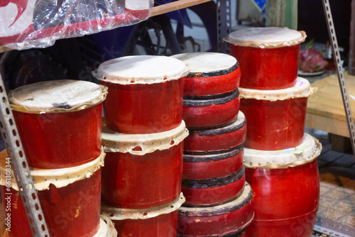Closeup of small drums used for lion dancing on sale in Vietnam © Minh Chung Bui