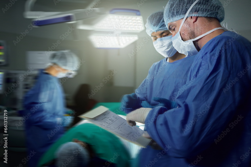 Healthcare, surgeon and a team in a hospital for surgery together, working in theater to save a life. Medical teamwork, emergency and doctors in the operating room of a clinic for an operation Healthcare, surgeon and a team in a hospital for surgery together, working in theater to save a life. Medical teamwork, emergency and doctors in the operating room of a clinic for an operation