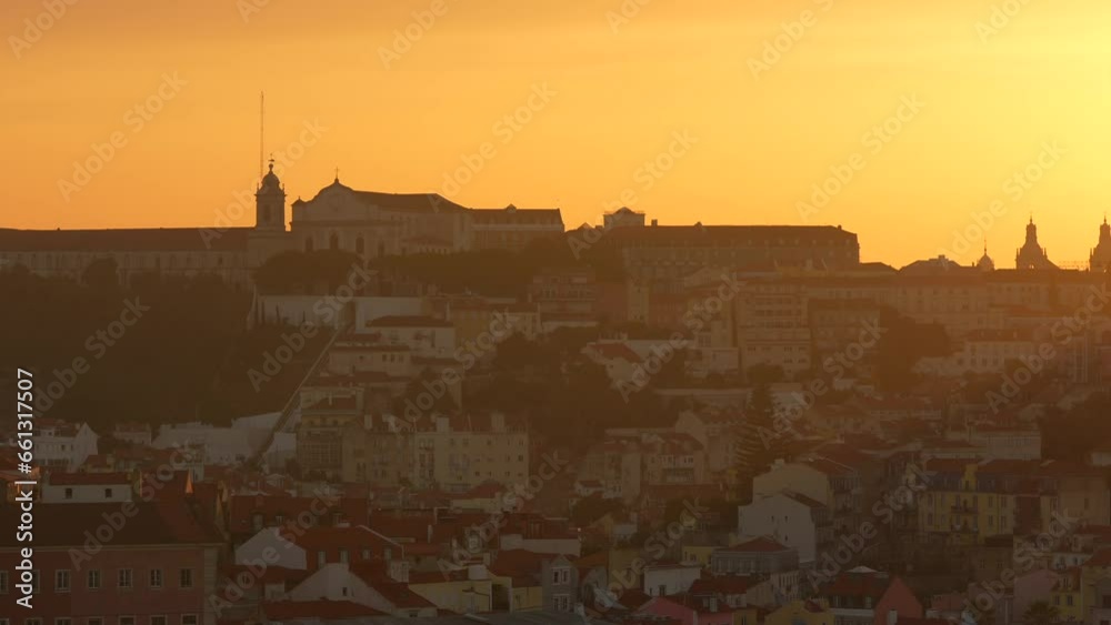 Sunrise over Lisbon. 4K video Portugal, aerial view above over Lisbon city in the early morning with fortress, flags and landmarks. Travel to Portugal. Sunrise over Lisbon. 4K video Portugal, aerial view above over Lisbon city in the early morning with fortress, flags and landmarks. Travel to Portugal.