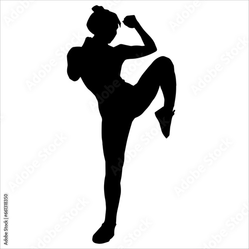 Silhouette of a woman doing kickboxing martial art. Silhouette of a sporty female muay thai athlete.