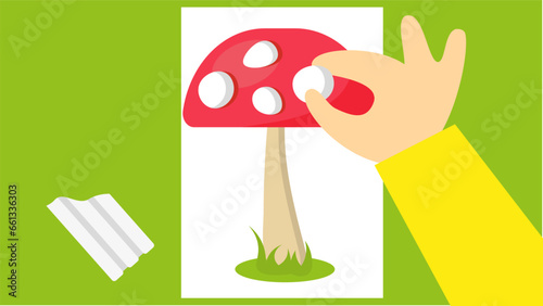 A boy is making an applique of a mushroom. Vector illustration in flat style.