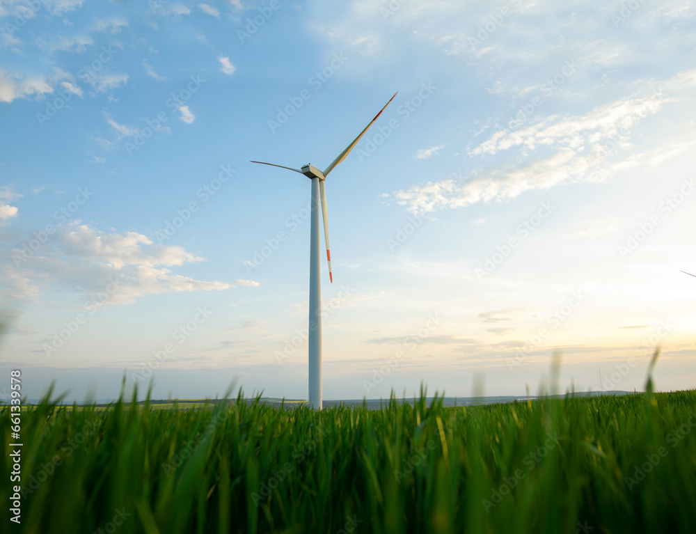 Windmill turbine generating green energy electric. Windmill turbine generating green energy electric.