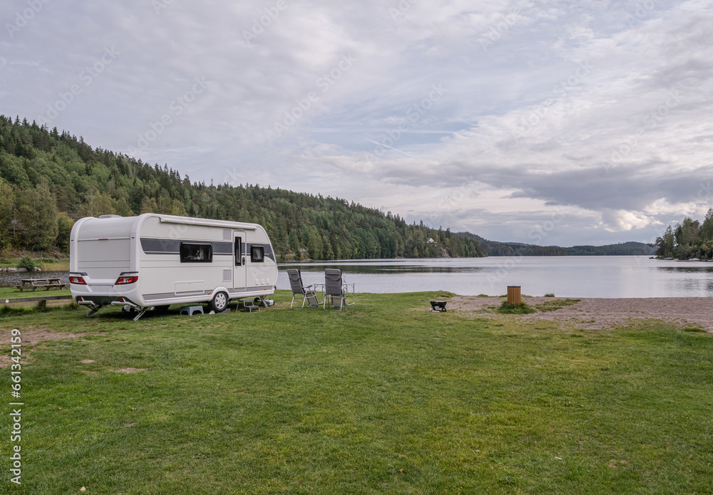 campsite camping caravan by lake Ragnerudssjoen in Dalsland Sweden beautiful nature forest pinetree - obrazy, fototapety, plakaty 