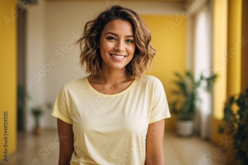 portrait of a young gorgeous women smiling with white mock up t-shirt