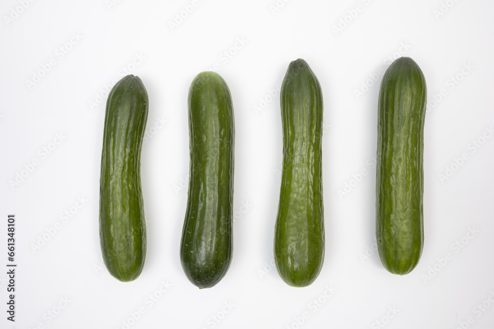 healthy, fresh cucumber on white background healthy, fresh cucumber on white background