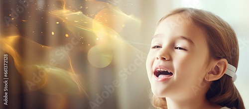 Therapy to help a girl improve speech articulation With copyspace for text