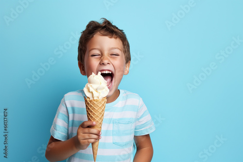 Cheerful happy kid eating ice cream in waffle cone isolated on blue background with copy space. Generative AI.