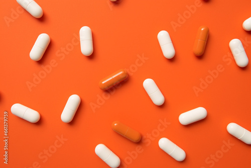 Medicine pills and tablets , painkillers or drugs on pastel border background. Top dwon view. Generative Ai